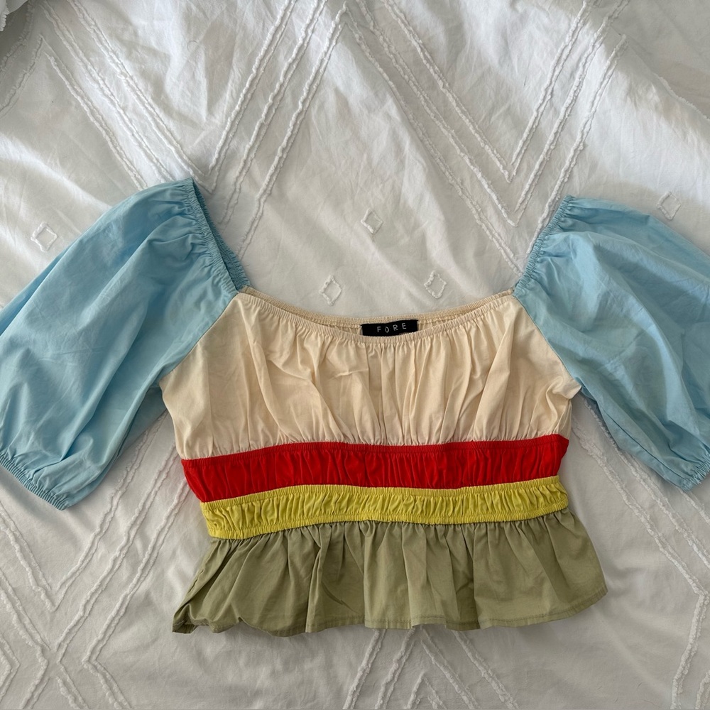 Colorful top with bows on the side